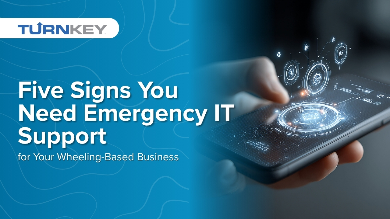 Hand holding smartphone displaying digital interface and text "Five Signs You Need Emergency IT Support for Your Wheeling-Based Business" with TURNkey logo.